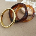Detailed view of 3-piece set featuring golden metal and amber resin stacking bangles - 23# Tortoiseshell Bracelet (HB4526)