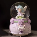 Purple resin music box with blue-haired elf and white rabbit inside crystal snow globe - 2514 Purple Base / Medium 80mm Light + Music