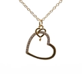 Golden heart necklace for women with zircon devil eye pendant on white background - Half Pave Diamond Heart