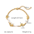 Detailed view of a gold pearl bracelet with abstract metal accents and 19+5cm chain length - Gold Pearl Ornament Bracelet (HC-B20170)