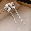 Silver petal tassel earrings with textured finish and long snake chain drops - Silver