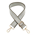 Detail of adjustable blue and beige striped bag strap with gold metal lobster clasps - Light Blue