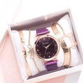 Detail view of purple quartz watch with diamond flower dial and gold bracelet set in box - Purple + Bracelet + Box