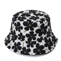 Top-down view of summer cotton bucket hat featuring vintage black floral prints - M (56-58cm) / Black