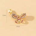 Macro detail of gold butterfly pendant with colorful stones and 2.6cm width measurement - Style H-Multicolor Gems (1.3x2.6cm)