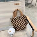Minimalist brown checkered corduroy tote bag with snap button on a beige folding chair - Dark Brown Checkerboard