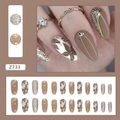Macro detail of ballerina press-on nails with sparkling rhinestones and floral textures - Z733 Long Island Iced Tea