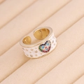 Detail of evil eye heart ring with white enamel finish and colorful zircon on beige tray - Adjustable Open / 7# Heart White