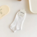 White ribbed crew socks for women featuring vertical stripes and a minimalist cotton design - One Size / Pure White