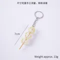 Miniature realistic food keychain featuring yellow sugar-coated beads on a wooden stick - 7.5cm Translucent Candied Haws - Keychain