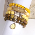 Bohemian stacked bracelet set featuring yellow faceted beads and a druzy stone charm - Yellow