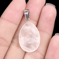 Natural rose quartz teardrop pendant with silver bail shown in hand for size - Clear Quartz (1pc)