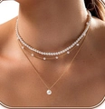 Three-layer gold necklace set featuring pearl choker and heart pendant layered style - Style 10 / Gold