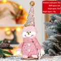 Muñeco de nieve rosa de Navidad con patas telescópicas y decoración de lentejuelas - Muñeco de Nieve 34CM