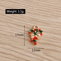 Detail view of enamel candy cane pendant with gold bow showing 17mm by 12mm dimensions - Candy Cane Decor (YD148)
