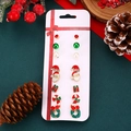 Détail du lot de six paires de boucles d'oreilles de Noël avec Père Noël et boîtes cadeaux - 03 Couronne de Noël