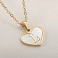 Delicate heart-shaped necklace with white shell inlay and golden letter L pendant - Letter L