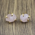 Detailed view of pink natural crystal stone earrings in a four-claw gold-plated setting - Rose Quartz