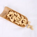 Artificial PVC cashew nuts in a bamboo shovel for realistic food prop decoration - Roasted Cashews (500g)