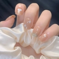 Nude heart glitter press-on nails with star patterns and gold shimmer on silk background - Nude Heart Glitter Style (JP1027) / 24 Pcs/Set