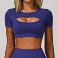 Nauwsluitende donkerpaarse yoga crop top met uitsnijding aan de voorkant voor fitness - S / Rozig Blauw