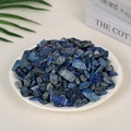 Natural blue lapis lazuli crushed stones for aromatherapy displayed in a white dish - Lapis Lazuli (9-12mm) 100g