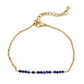 Minimalist gold stainless steel bracelet featuring faceted blue lapis lazuli stones - Dark Blue