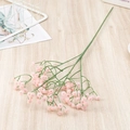 Close-up of realistic pink artificial baby's breath flowers on a light wood tabletop - Real Touch-Pink