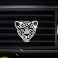 Sparkling leopard head car vent clip featuring silver rhinestones on a black vent - [Silver] Leopard Head