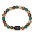 Macro detail of Aries zodiac tiger eye and agate beaded bracelet with matte black charm - Aries