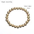 Detail of 8mm golden stainless steel beaded bracelet showing bead size and 44.8g weight - 8mm Bead Diameter - Elastic Style (YB-852G-8mm)