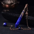 Macro detail of hexagonal lapis lazuli crystal pendant with vintage bronze filigree - Antique Bronze Lapis Lazuli
