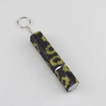 Detail of refillable perfume bottle with leopard print rhinestones and silver keychain - Sunflower