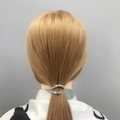Minimalist silver alloy twisted hair clip shown on low ponytail hairstyle for women - Silver