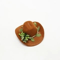 Close-up of mini brown felt cowboy hat with green berry accents for bottle decoration - Bouquet / Brown