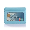 Detail of light blue lychee pattern leather card holder with clear ID window and fine stitching - Blue