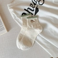 Speckled off-white crew socks with green ribbed cuffs and cute puppy embroidery - One Size / Green Edge