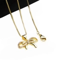 Elegant gold bow pendant necklace with shimmering cubic zirconia micro-paved detailing - Pendant And Necklace (12)