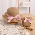 Détail de chapeau de soleil en paille pour enfants et sac assorti avec nœud rose - Chapeau Kaki + Sac