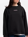 Chic black crewneck sweatshirt with pink letter print and drop shoulder design for women - Black