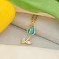 Golden tulip necklace with blue opal stone and zircon leaves in a jewelry box - Blue Cat Eye Rose / Gold