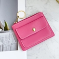 Pink faux leather coin purse with golden zipper and keychain on marble background - Rose Red