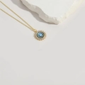 Golden evil eye choker necklace with white zircon stones and resin blue eye pendant - Patterned Evil Eye
