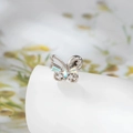 Silver butterfly cartilage stud earring with rainbow opal stones on white pedestal - AB Color Butterfly (Single)