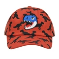 Close-up of blue dinosaur embroidery on a red kids baseball cap with silhouette patterns - Red