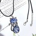 Cat shaped natural crystal pendant with silver alloy frame on a black leather cord necklace - Blue Spot Stone