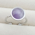 Detailed close-up of a purple gemstone on an adjustable silver stainless steel ring band - 10mm Round - Amethyst