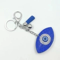 Sparkling rhinestone evil eye keychain with blue tassel and crystal-encrusted charm - Sapphire Blue