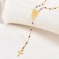 Close-up of 18K gold-plated stainless steel rosary with blue beads and a crucifix - Royal Blue