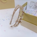 Detail of luxury crystal headbands with champagne rhinestones and pearlescent accents - Double Row Crystal Style / Double Row Crystal Champagne